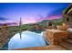 Stunning view of the negative edge pool and jacuzzi at 42237 N 107Th Pl, Scottsdale, AZ 85262