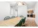 Dining area featuring a view into the kitchen at 4401 W Lewis Ave, Phoenix, AZ 85035