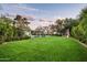 Aerial view of a lush backyard with pool and detached covered patio at 4716 N Dromedary Rd, Phoenix, AZ 85018