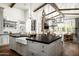 Large kitchen with granite countertops, white cabinets, and an oversized kitchen island at 4716 N Dromedary Rd, Phoenix, AZ 85018