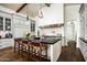 Kitchen island with stone countertops, custom cabinets, and an open layout great for entertaining at 4716 N Dromedary Rd, Phoenix, AZ 85018