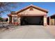 Spacious two-car garage with a wide driveway and plenty of storage space at 5622 E Emerald Cir, Mesa, AZ 85206