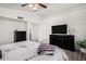 Bright main bedroom with a ceiling fan, a large closet, and a chest of drawers at 5761 E Tierra Buena Ln, Scottsdale, AZ 85254