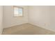 Bright bedroom with carpet and a window that provides natural light at 5808 E Brown Rd # 110, Mesa, AZ 85205