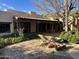 Lush backyard patio with outdoor seating and garden views at 6242 E Maverick Rd, Paradise Valley, AZ 85253