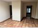 Tiled hallway features arched doorways and leads to various rooms in the home at 6242 E Maverick Rd, Paradise Valley, AZ 85253