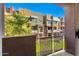 A view from the balcony overlooking the surrounding community, showcasing the building's exterior at 6605 N 93Rd Ave # 1024, Glendale, AZ 85305