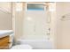 Bathroom with toilet and tub with shower at 6605 N 93Rd Ave # 1024, Glendale, AZ 85305