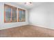 Bedroom with ceiling fan and wood shutter blinds at 6605 N 93Rd Ave # 1024, Glendale, AZ 85305