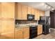 The eat-in kitchen showcases granite countertops and appliances, creating a stylish and functional culinary space at 6605 N 93Rd Ave # 1024, Glendale, AZ 85305