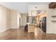 Well-equipped kitchen featuring a breakfast bar, sleek black appliances, and ample counter space for culinary enthusiasts at 6605 N 93Rd Ave # 1024, Glendale, AZ 85305