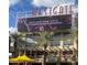 Westgate entertainment district featuring sports bars and eateries with palm trees and outdoor seating at 6605 N 93Rd Ave # 1024, Glendale, AZ 85305