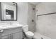 Modern bathroom featuring tiled shower and vanity at 6812 N 35Th Ave # G, Phoenix, AZ 85017