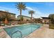 Community pool with ample seating and shaded areas at 7057 E Diamond St, Scottsdale, AZ 85257