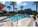 Community pool with lounge seating and palm trees at 7057 E Diamond St, Scottsdale, AZ 85257