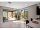 Bright dining area with sliding glass doors leading to outdoor patios at 7057 E Diamond St, Scottsdale, AZ 85257