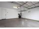 Spacious garage with a sealed floor for easy cleanup at 7057 E Diamond St, Scottsdale, AZ 85257