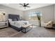 This main bedroom features a ceiling fan, neutral walls, and bright natural light at 7057 E Diamond St, Scottsdale, AZ 85257