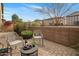 Relaxing outdoor patio area with seating, beautiful landscaping, and privacy fence at 7057 E Diamond St, Scottsdale, AZ 85257