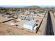 Expansive aerial view of property and surrounding neighborhood, featuring a large metal garage at 711 W Paso Nuevo Dr, Phoenix, AZ 85086