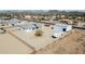 Lovely aerial view of a backyard, featuring a large metal garage at 711 W Paso Nuevo Dr, Phoenix, AZ 85086