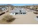 Aerial view of a backyard showcasing a covered patio area and a jacuzzi tub at 711 W Paso Nuevo Dr, Phoenix, AZ 85086