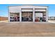 Exterior of a metal building featuring multiple garage doors, providing versatile storage and access at 711 W Paso Nuevo Dr, Phoenix, AZ 85086