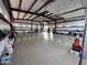 Massive shop garage featuring tall ceilings, insulated walls and coated floors with plenty of space at 711 W Paso Nuevo Dr, Phoenix, AZ 85086