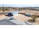 Aerial view of a detached metal garage with multiple bays, offering ample space for vehicles at 711 W Paso Nuevo Dr, Phoenix, AZ 85086