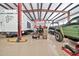 Spacious garage interior featuring RV, boat, car and car lift, ideal for car enthusiasts and storage needs at 711 W Paso Nuevo Dr, Phoenix, AZ 85086