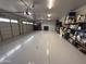 Spacious three car garage with coated floors, overhead lighting and plenty of storage space at 711 W Paso Nuevo Dr, Phoenix, AZ 85086