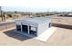 A large metal detached garage features multiple bays, concrete slab, and metal construction at 711 W Paso Nuevo Dr, Phoenix, AZ 85086