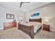 Well-lit main bedroom featuring furnishings and ensuite bathroom at 711 W Paso Nuevo Dr, Phoenix, AZ 85086