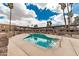 Community swimming pool featuring clear, blue water and desert landscaping at 7110 E Continental Dr # 1031, Scottsdale, AZ 85257