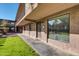 A well-maintained condo complex featuring green lawns and convenient walkway access to units at 7110 E Continental Dr # 1031, Scottsdale, AZ 85257