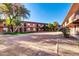 Apartment complex with two-story buildings surrounding a central courtyard at 7110 E Continental Dr # 1031, Scottsdale, AZ 85257