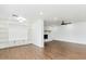 Spacious living room featuring bright built-in shelving, fireplace, and open layout at 739 E Glade Ave, Mesa, AZ 85204