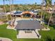 Expansive aerial view of this residence showcasing a stunning pool, patio, and lush landscaping at 8008 N 66Th St, Paradise Valley, AZ 85253