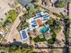 Aerial view of a large home with solar panels, an inviting pool, and meticulously landscaped grounds at 8008 N 66Th St, Paradise Valley, AZ 85253