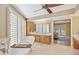 Bright bathroom features a soaking tub near a window and double sinks at 8008 N 66Th St, Paradise Valley, AZ 85253