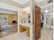 Bathroom features a vanity, a walk-in closet, and a view of the living room at 8008 N 66Th St, Paradise Valley, AZ 85253