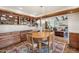 Cozy dining area connected to the living room with wood cabinets at 8008 N 66Th St, Paradise Valley, AZ 85253