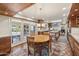 Dining area with french doors leading to an outdoor patio and a view of the kitchen at 8008 N 66Th St, Paradise Valley, AZ 85253