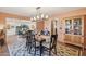 Dining room featuring a modern chandelier and unique wall decor at 8008 N 66Th St, Paradise Valley, AZ 85253