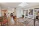 Inviting foyer with skylight, decorative rug, and French doors leading to an outdoor area at 8008 N 66Th St, Paradise Valley, AZ 85253