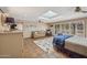 The main bedroom features a skylight, tiled floors, a seating area, a large closet and lots of natural light at 8008 N 66Th St, Paradise Valley, AZ 85253