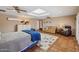 The main bedroom features a skylight, tiled floors, a seating area, a large closet and lots of natural light at 8008 N 66Th St, Paradise Valley, AZ 85253