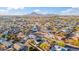 Aerial view of neighborhood in residential area with mountain views in the distance at 8215 E Cypress St, Scottsdale, AZ 85257