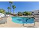 Large community pool with ample lounge seating for residents to enjoy at 8588 E Indian School Rd # G, Scottsdale, AZ 85251