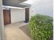 Private entryway featuring a gated doorway and desert landscaping at 8588 E Indian School Rd # G, Scottsdale, AZ 85251